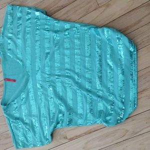 Size small/medium sparkly top teal color